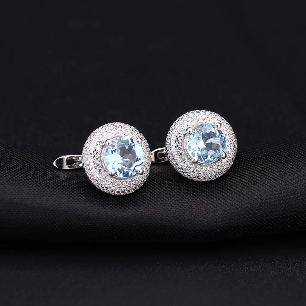 Opulent Blue Topaz Halo Clear Cubic Zirconia Cluster Stud Earrings - Image 2