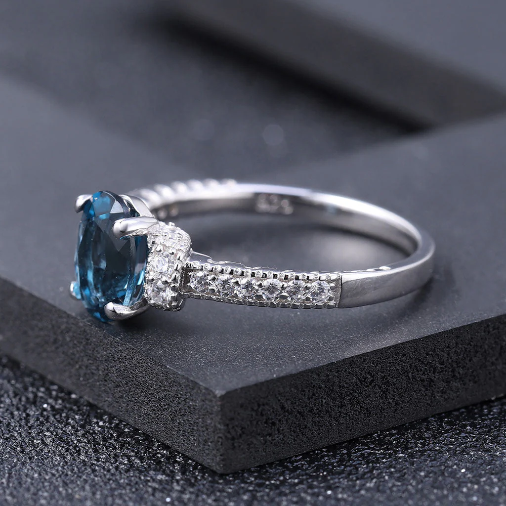 Opulent Clear Cubic Zirconia London Blue Topaz Halo Ring - Image 3