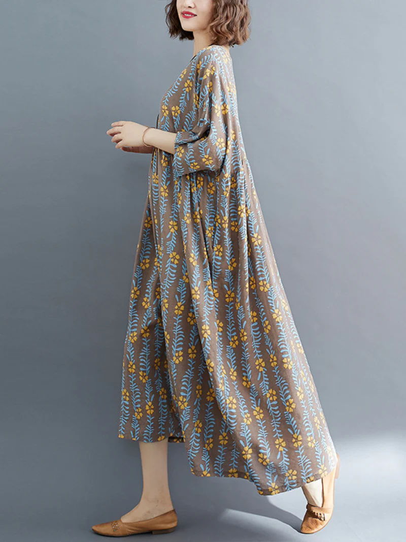 women summer loose round neck print short-sleeved plus size mid-length smocked dress - Image 3